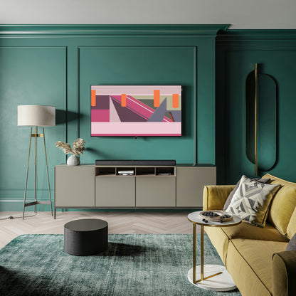 A mockup of the Ordre Minimal wallpaper displayed on a TV in an elegant living room with dark green walls. On the screen is a still image of the "Verdun: A Dialogue with Concrete" illustration, rendered in the warm, atmospheric Harvest Lune colour theme.